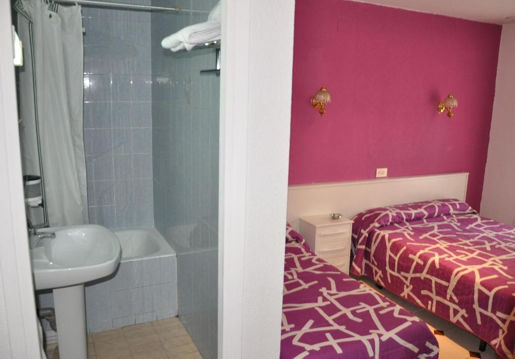 Hostel Central Saragoça Quarto foto